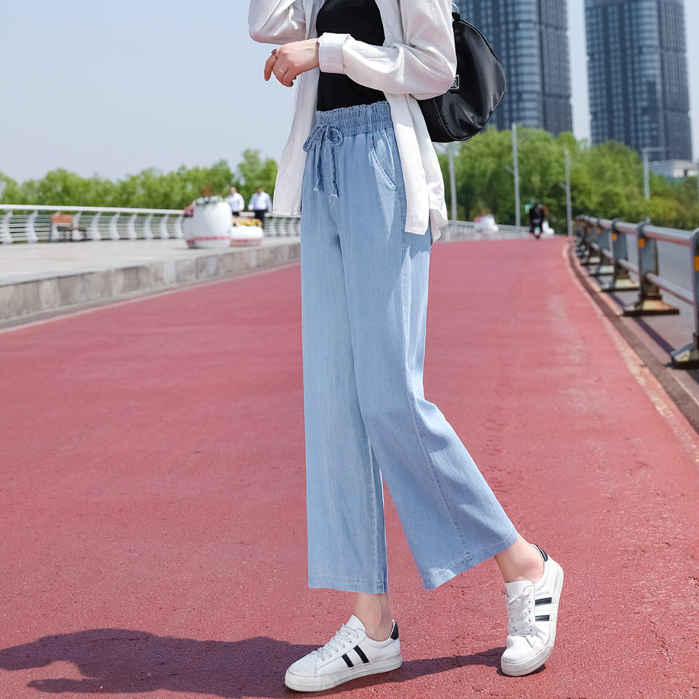Himmelblaue Tencel-Jeans mit hoher Taille und weitem Bein und Taschen