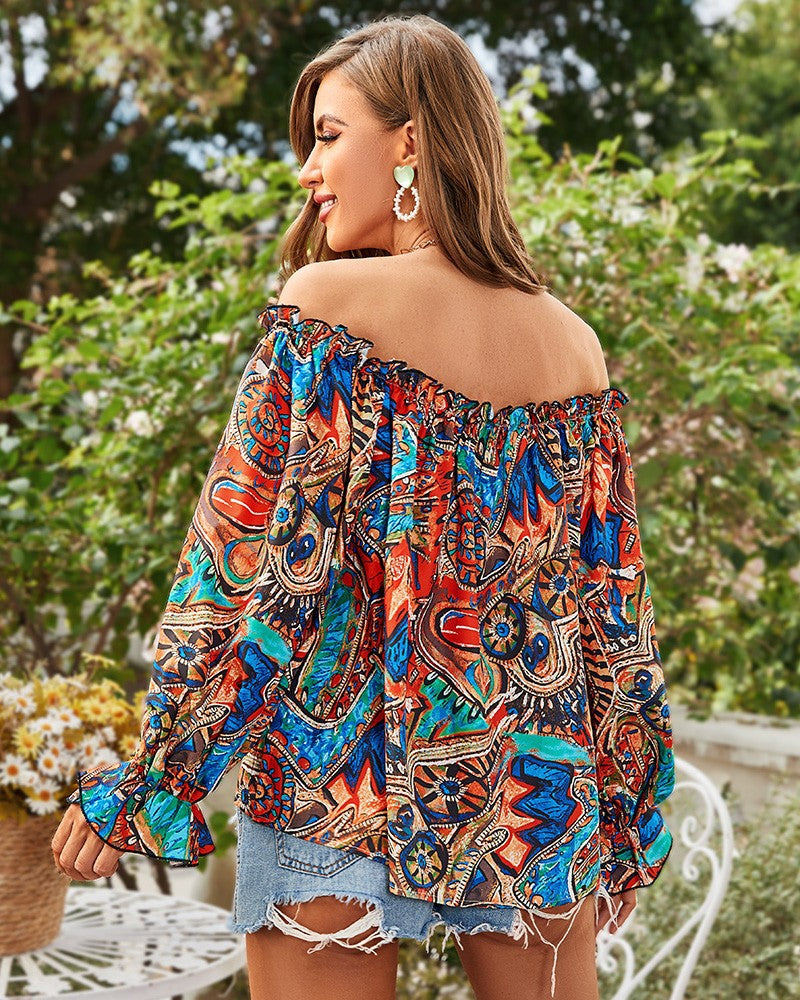 Blusa con hombros descubiertos y estampado brillante de Taj 