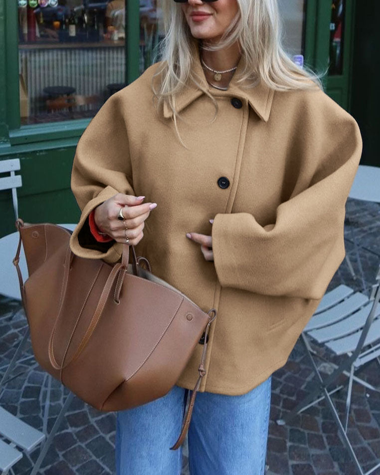 Chaqueta tipo cárdigan de lana marrón con cuello chal y mangas murciélago