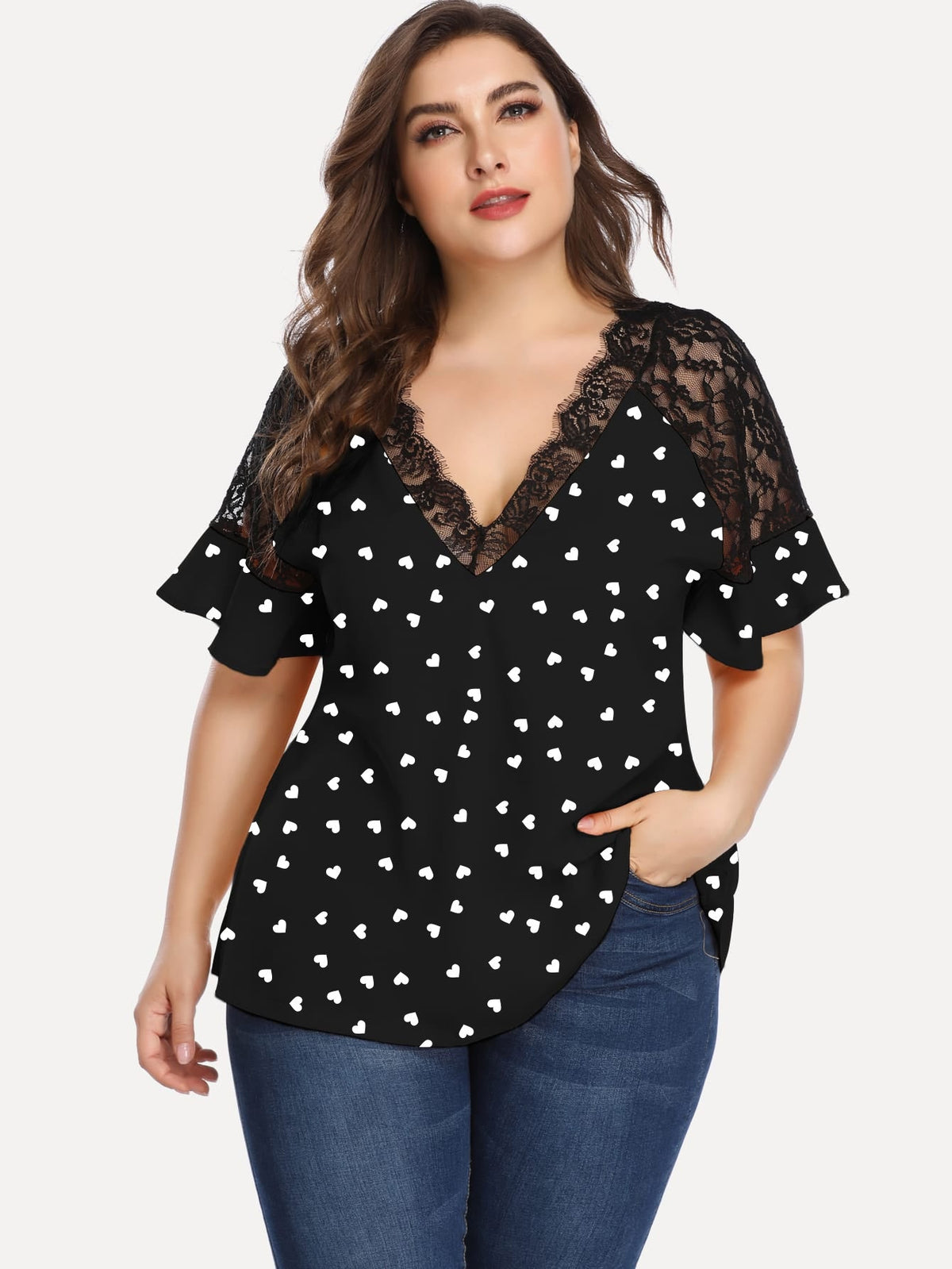 Camiseta de manga corta con lunares y mangas huecas informal