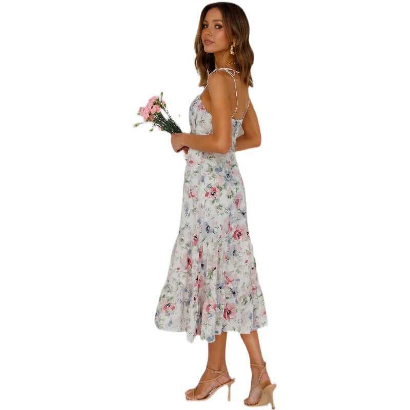 Hulda – Asymmetrisches Maxikleid mit gesmoktem Blumenmuster