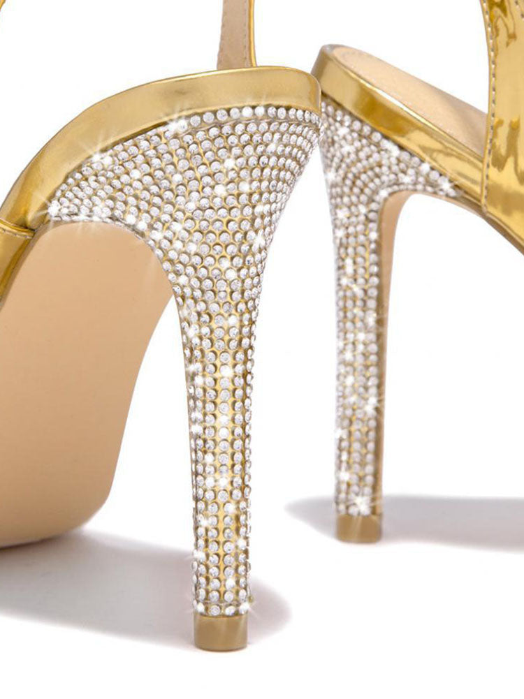 Spitz zulaufende Pumps mit Strass