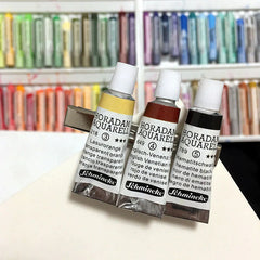 Pinzas para el cabello con tubos de pintura
