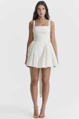 Vestido mini con lazo color marfil de Florianne