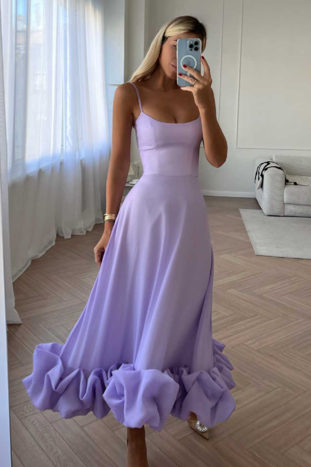 Vestido midi con bustier y volantes