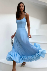 Vestido midi con bustier y volantes