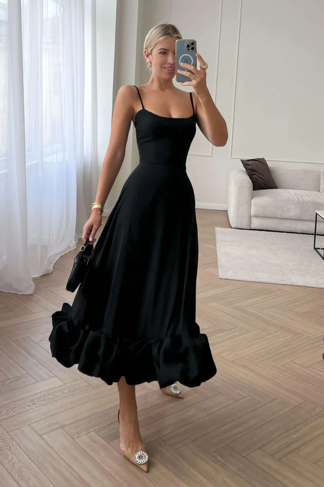 Vestido midi con bustier y volantes