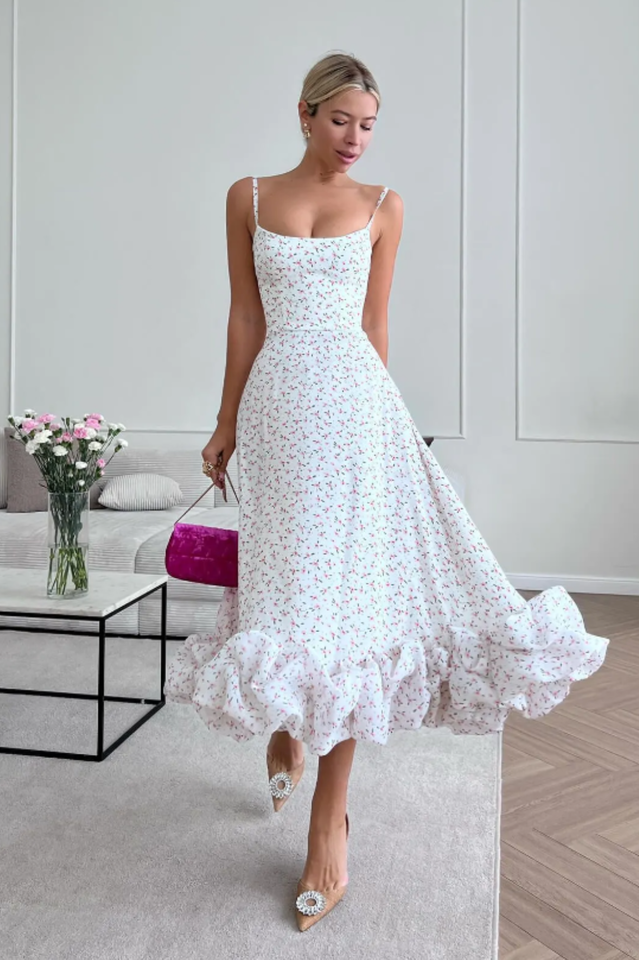 Vestido midi con bustier y volantes