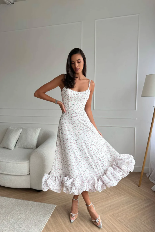 Vestido midi con bustier y volantes