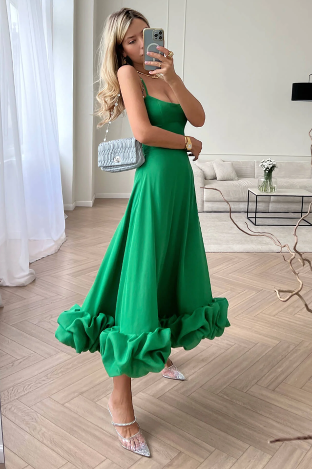Vestido midi con bustier y volantes