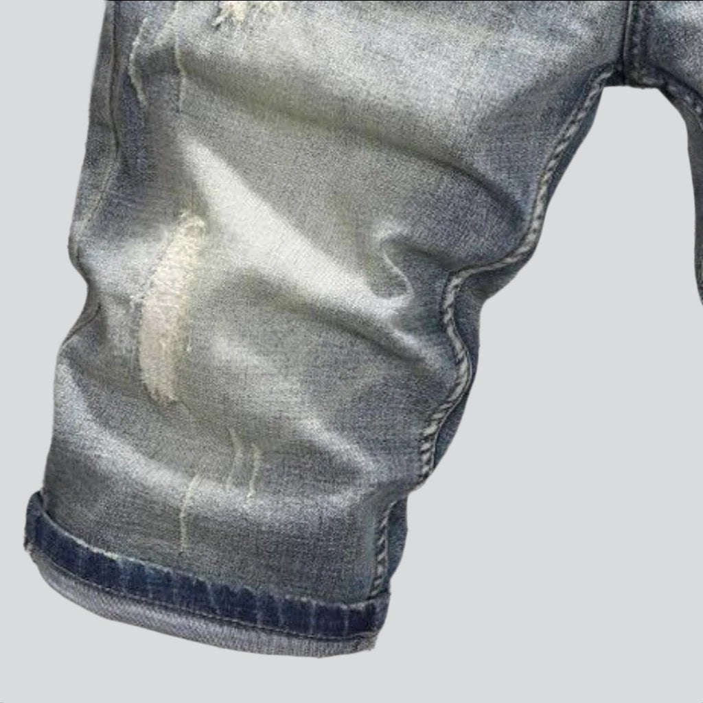 Elastische zerrissene Retro-Jeansshorts