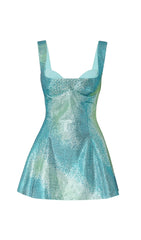 Minivestido verde con tirantes y lentejuelas en la espalda