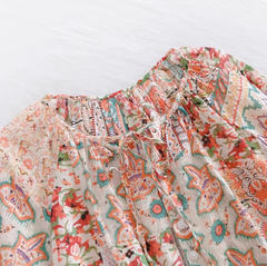 Babydoll-Bluse mit Blumenmuster und V-Ausschnitt