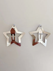 Pinza para el cabello con estrella hueca plateada