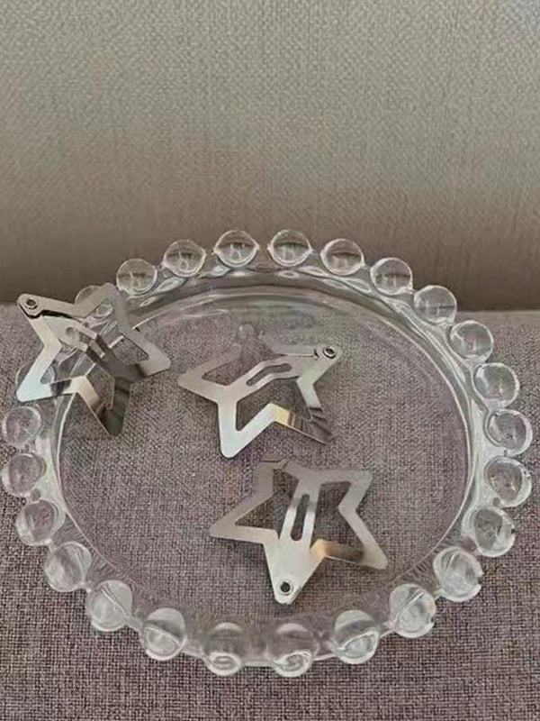 Pinza para el cabello con estrella hueca plateada