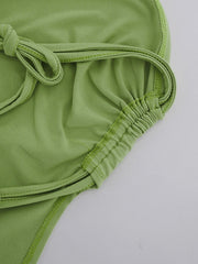 Grünes Bandeau-Top zum Binden hinten