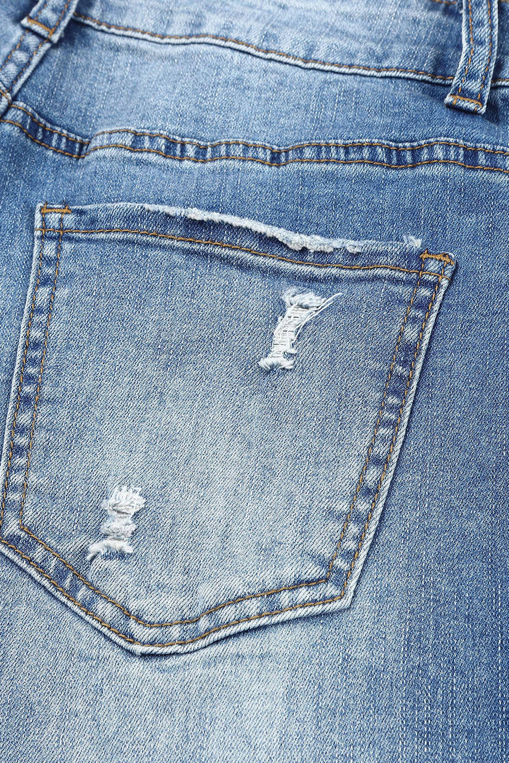 Distressed-Jeans mit Patchwork-Muster und Blumenmuster