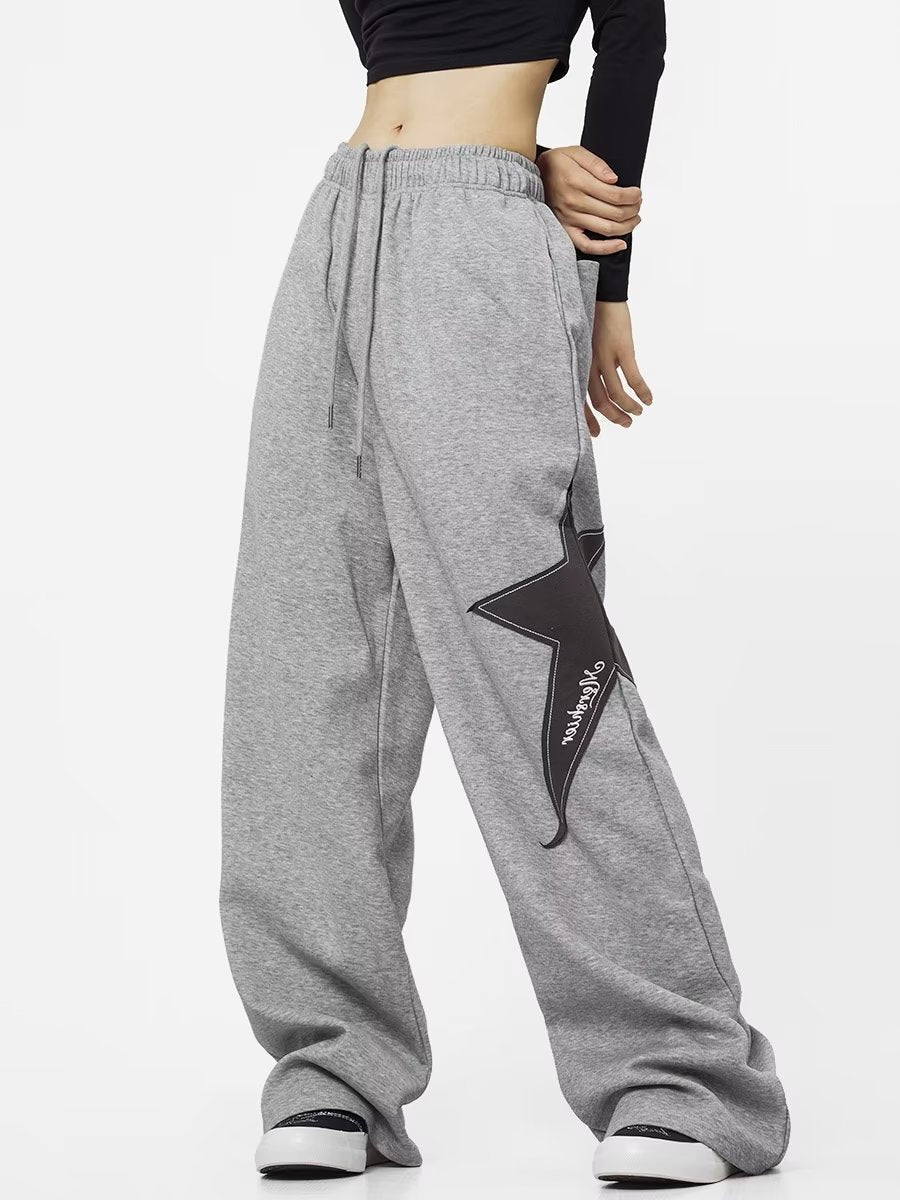 Graue Baggy-Jogginghose mit Stern-Patch