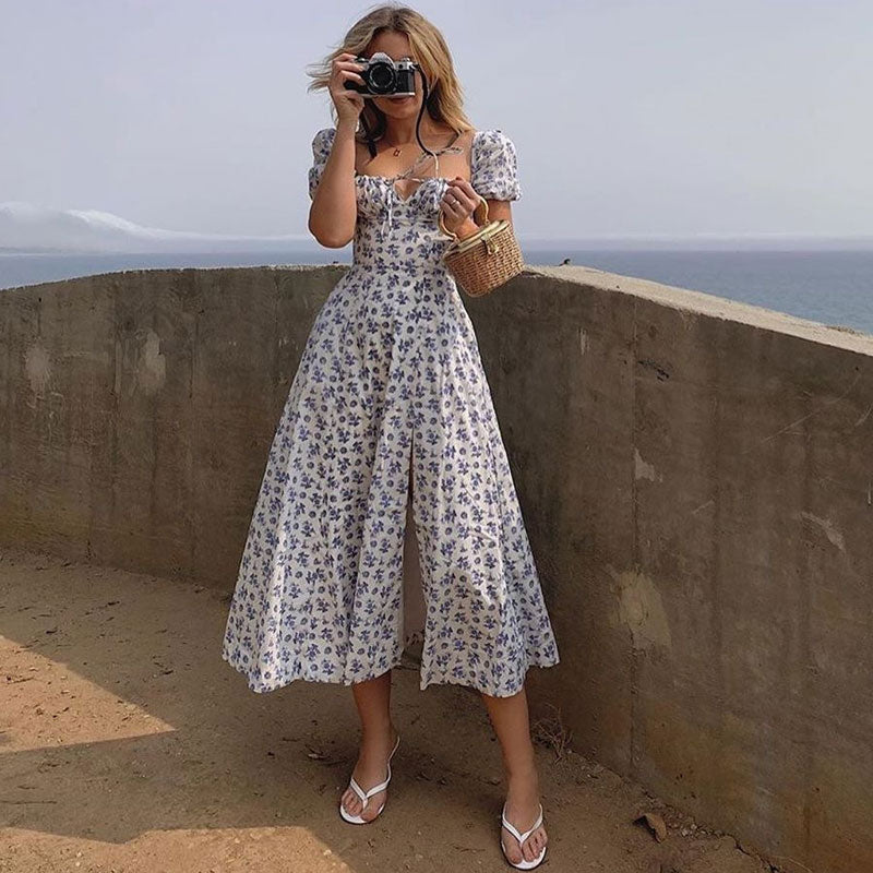 Vestido largo veraniego con mangas abullonadas y abertura alta, estampado de margaritas - Azul