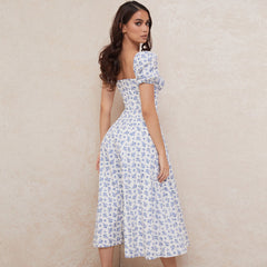 Vestido largo veraniego con mangas abullonadas y abertura alta, estampado de margaritas - Azul