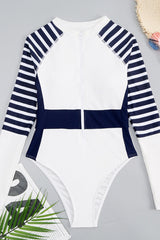 Weißer, marineblauer Badeanzug mit langen Ärmeln und Reißverschluss vorne