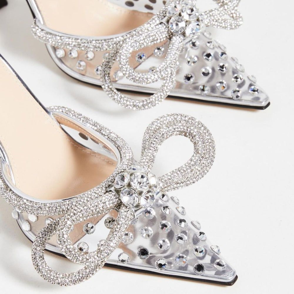 Tacones Showstopper con doble lazo y adornos de cristal 