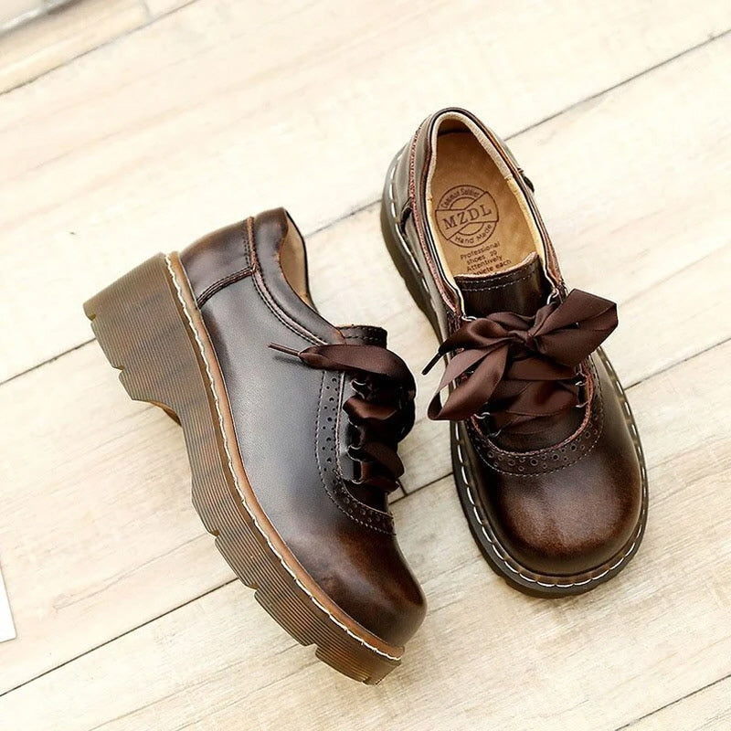 Oxford-Schuhe mit runder Zehenpartie und Retro-Schleife