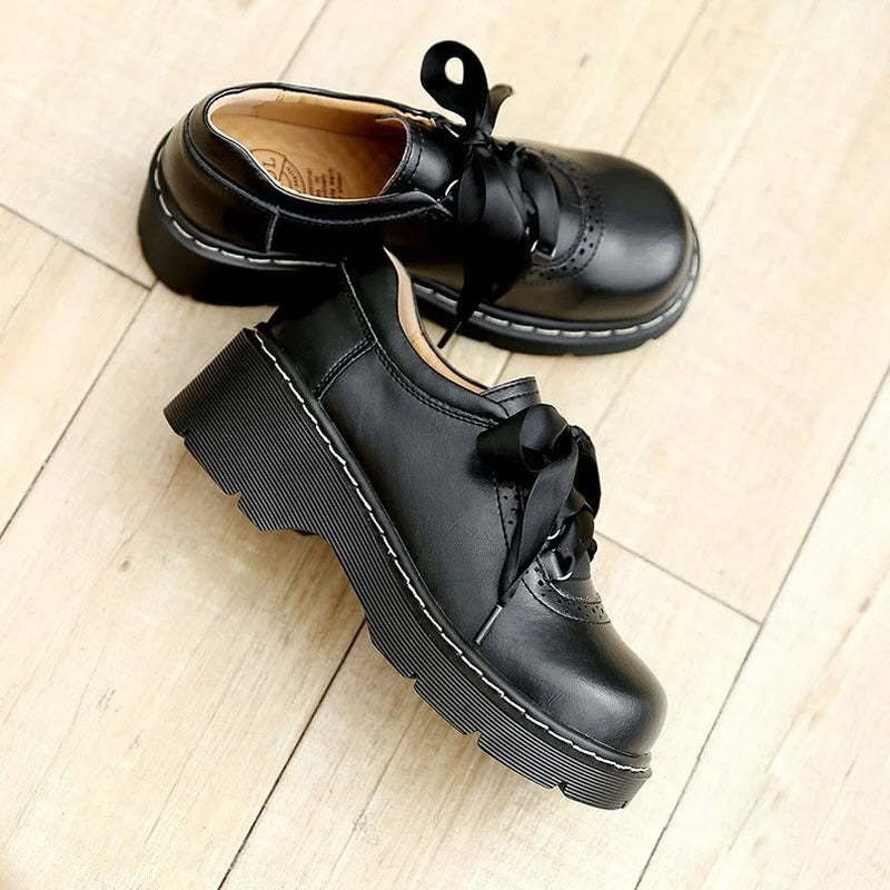 Oxford-Schuhe mit runder Zehenpartie und Retro-Schleife