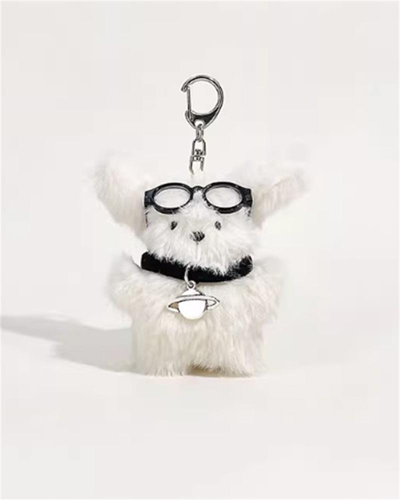 Flauschiger Study Pupper Schlüsselanhänger