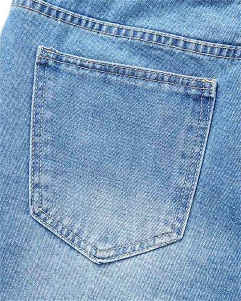 Sirius – Ausgestellte Jeans aus zerrissenem Denim