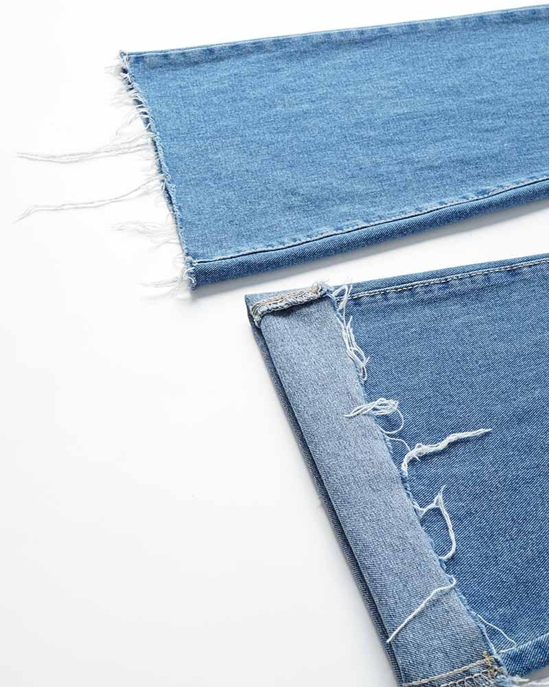 Sirius – Ausgestellte Jeans aus zerrissenem Denim