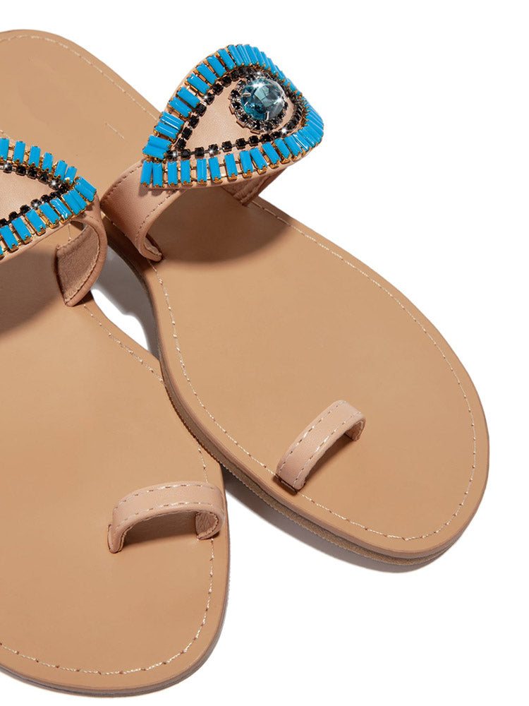 Slip-On-Sandalen mit bösem Blick