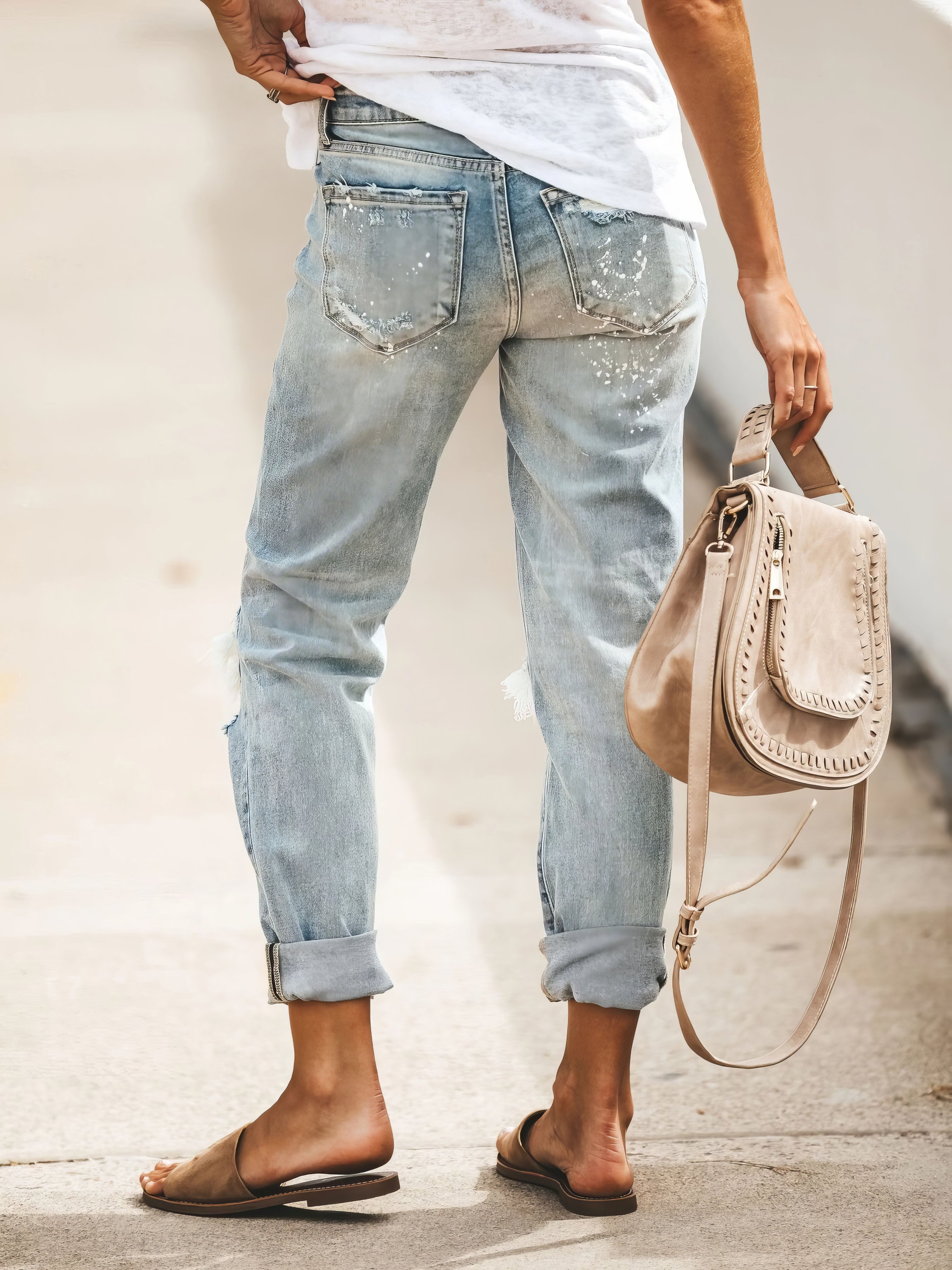 Pantalones vaqueros desgastados y rotos