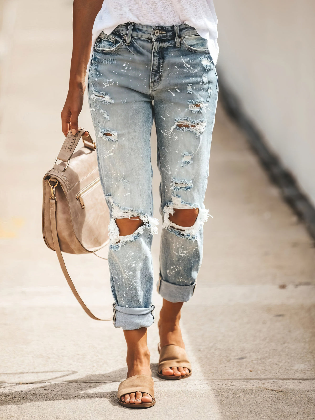 Pantalones vaqueros desgastados y rotos