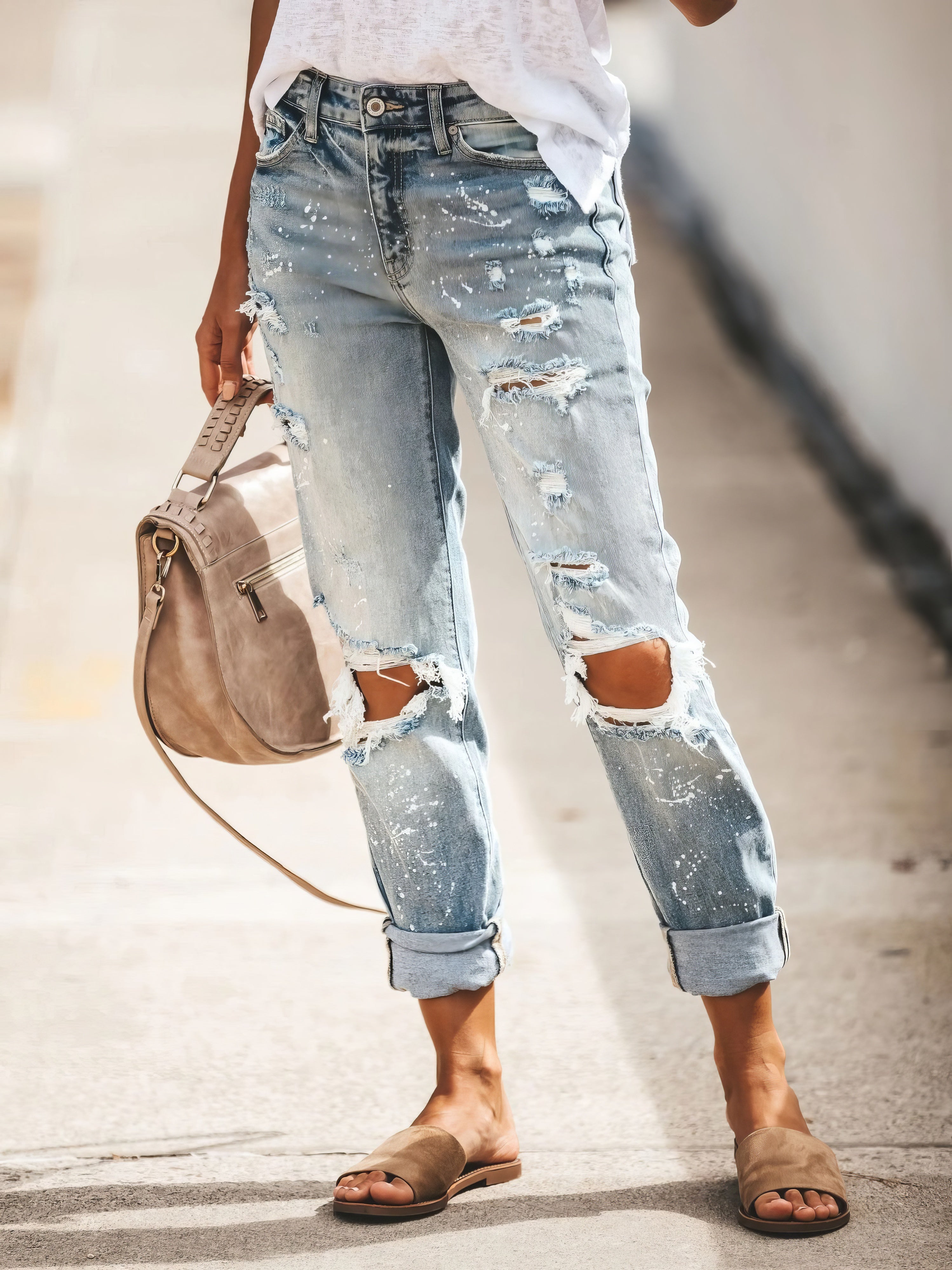 Pantalones vaqueros desgastados y rotos