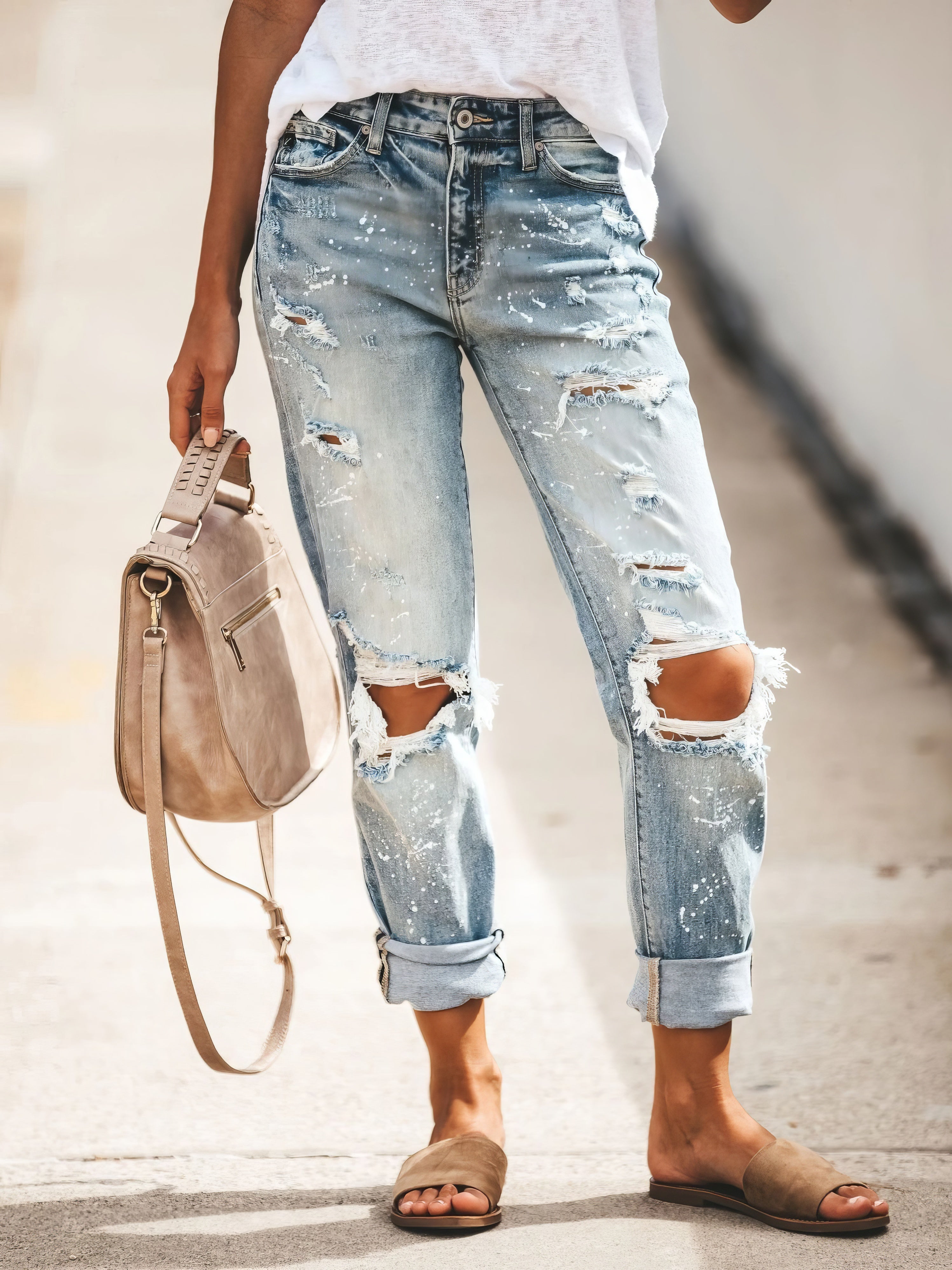 Pantalones vaqueros desgastados y rotos