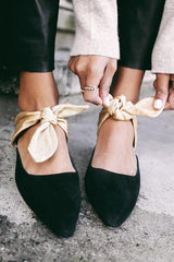 Mules con tacones de lazo