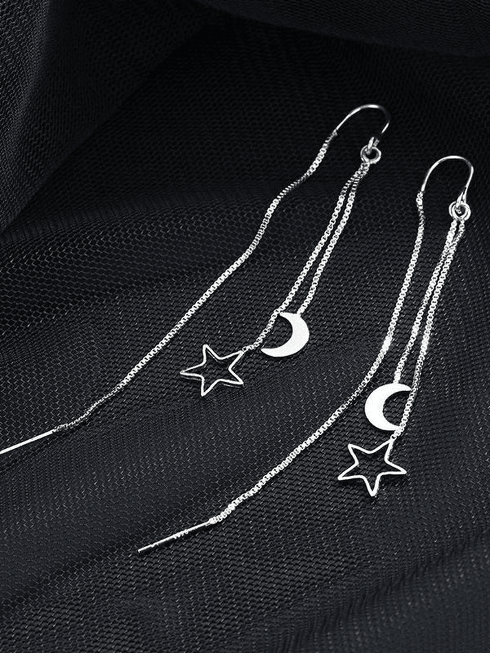 Pendiente de borla con decoración de estrella y luna