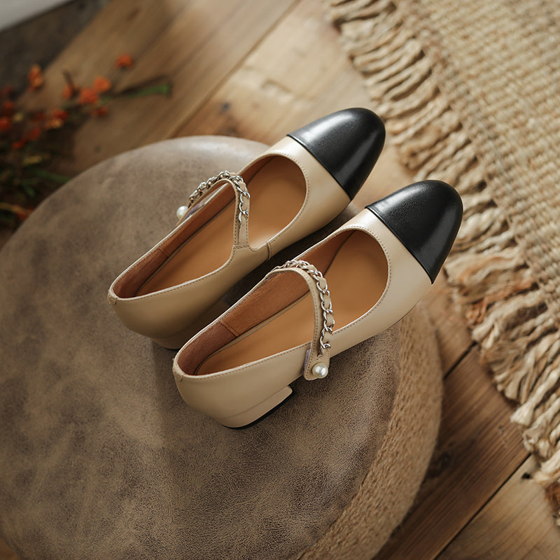 Mary Janes con puntera y cadena Daphne